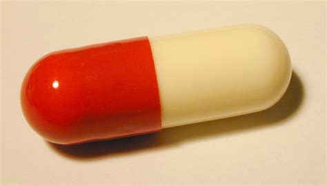 are required by the FDA to have an imprint code. . Red and white capsule no markings